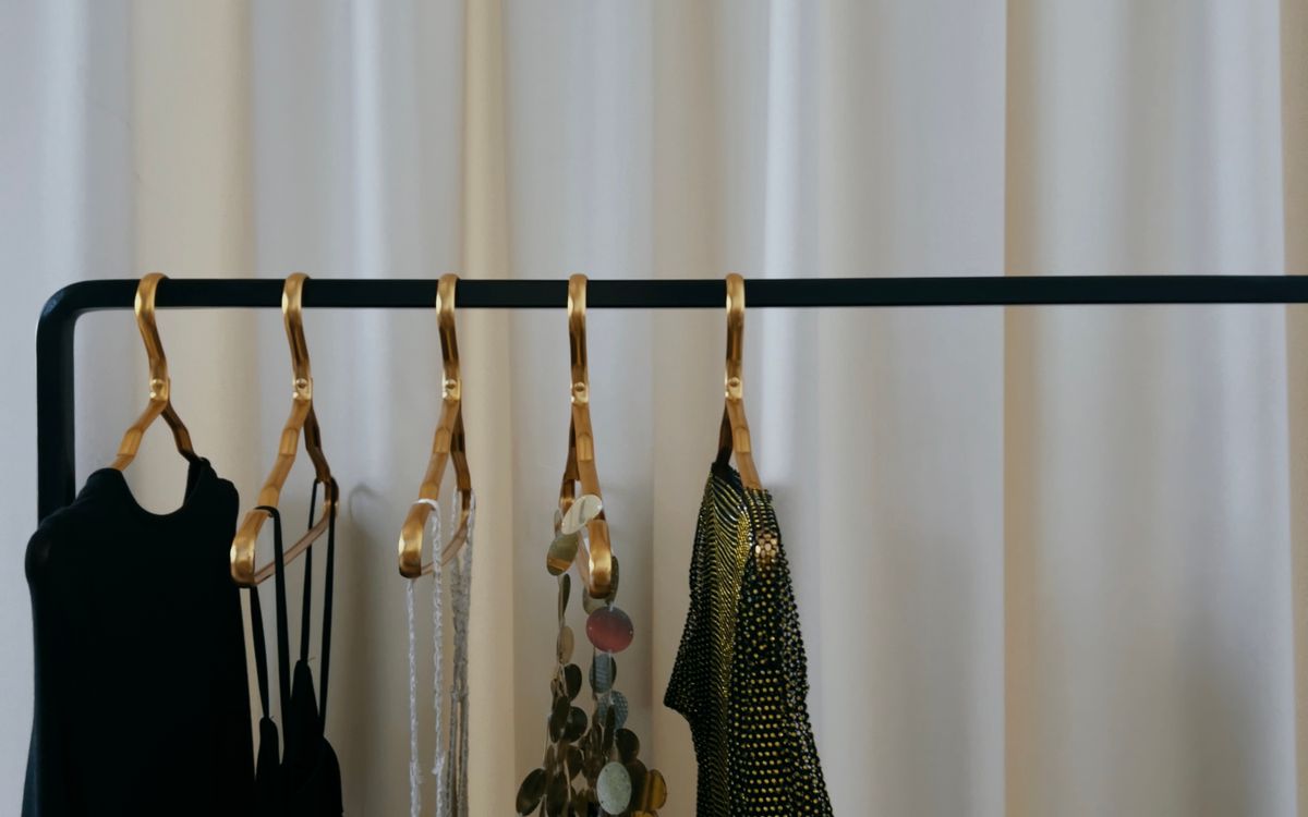 Dresses hanging on a clothing rack