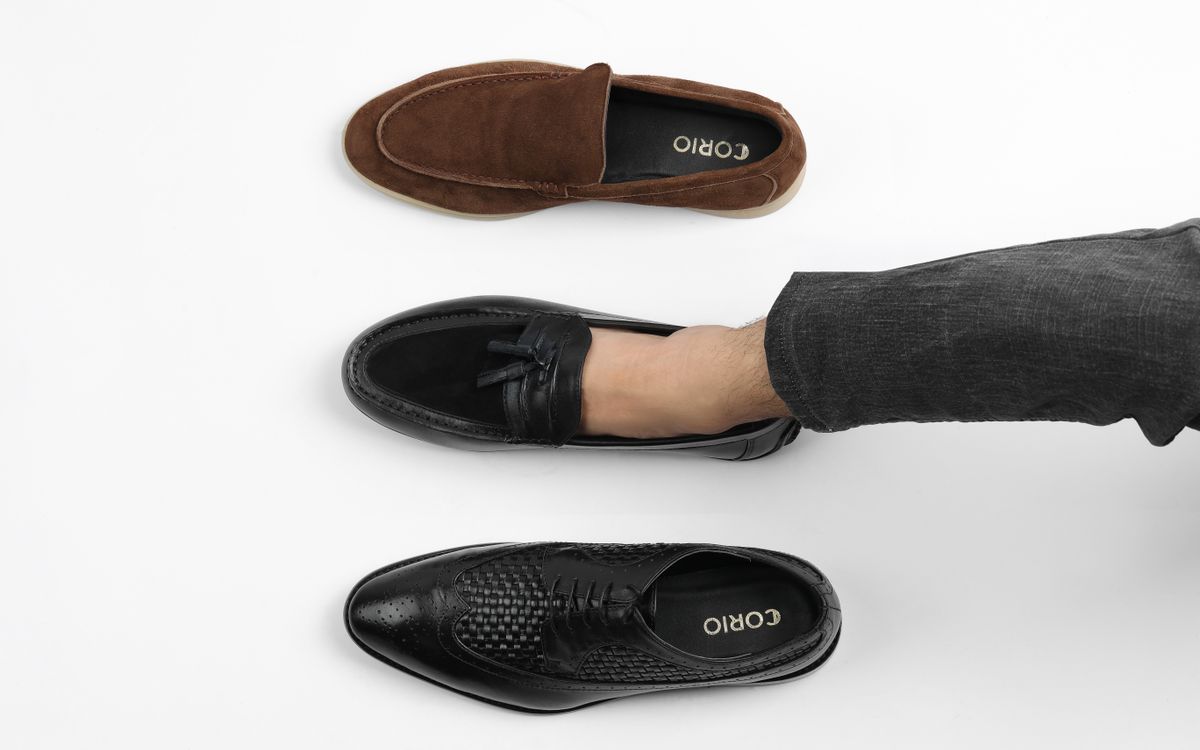Men's leather shoes displayed on a white background
